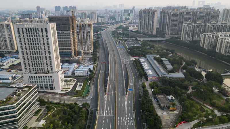 China locks down key transportation hub; markets fear economic fallout | CNN Business