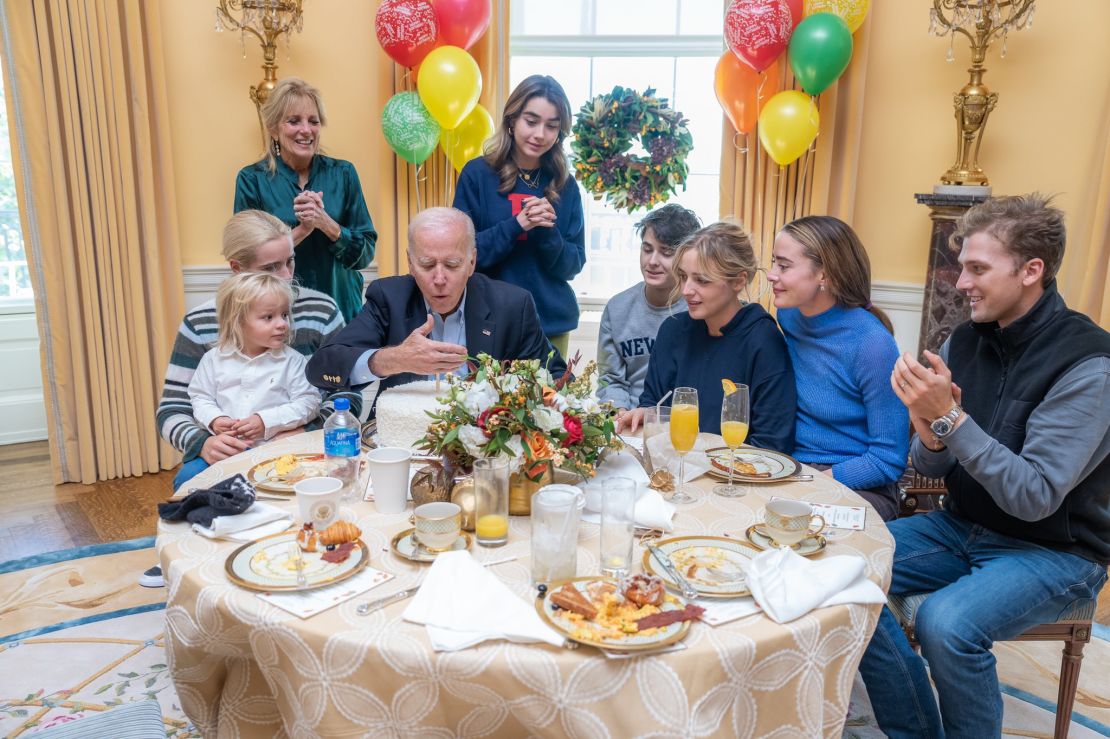 President Joe Biden celebrates his 80th birthday, blowing out the candle on his coconut birthday cake with first lady Jill Biden, Naomi Biden, her husband Peter Neal and other Biden grandchildren on Sunday, November 20, 2022.