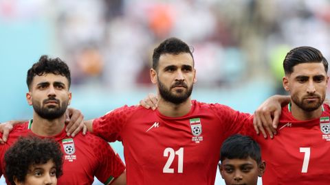 From left to right, Iran's defender Sadegh Moharrami and midfielders Ahmad Noorollahi and Alireza Jahanbakhsh pictured during the national anthem.