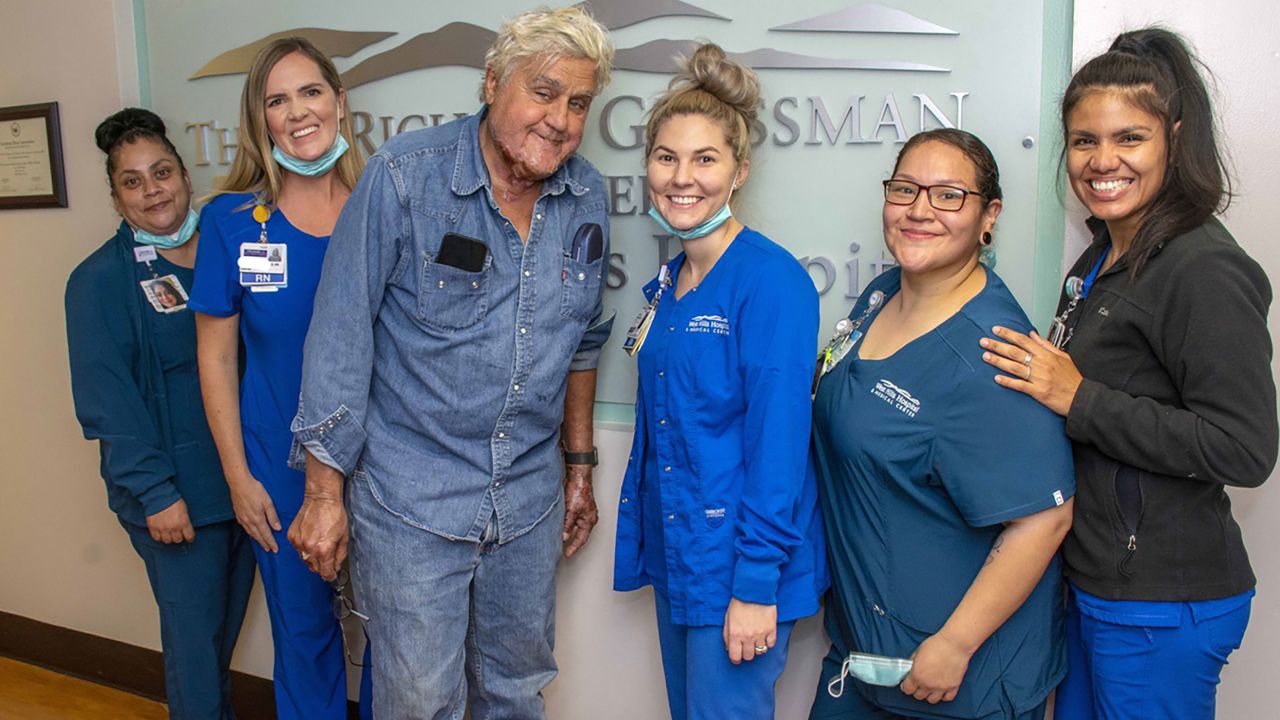 Jay Leno with staff of the Grossman Burn Center on Monday.