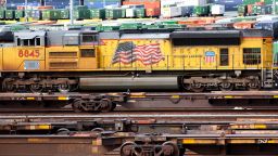 Freight trains and shipping containers are viewed in a Union Pacific Intermodal Terminal rail yard on November 21, 2022 in Los Angeles, California. 