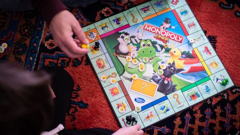 Hasbro's Monopoly board game remains a popular holiday gift as families still want to pass Go and try to buy Boardwalk.