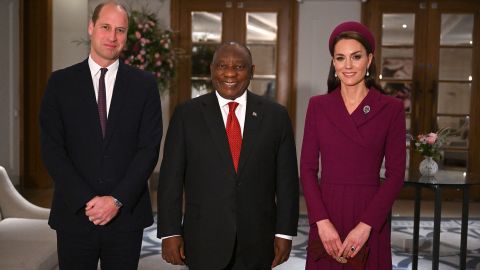 The Prince and Princess of Wales stand with South African President Cyril Ramaphosa (C) at the Corinthia Hotel in London.