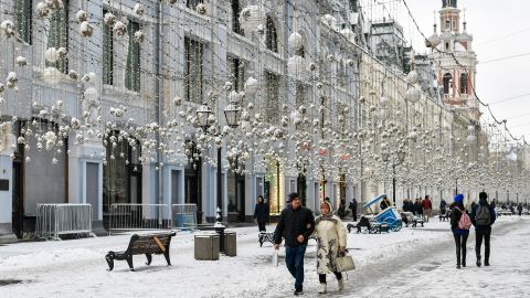 People walk in snow in Moscow, Russia, on November 17, 2022.