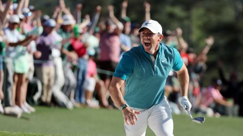 Rory McIlroy celebrates a sensational birdie chip from the bunker at The Masters in April.