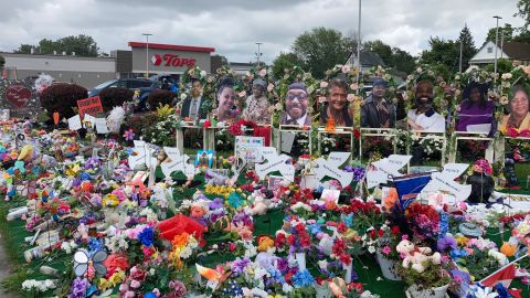 A memorial outside the Tops supermarket in Buffalo, New York, August 22, 2022, features the names and photos of the victims of the May 14 shooting.