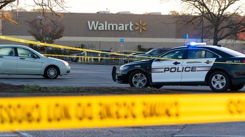 Police on Wednesday continued to process the scene of a mass shooting Tuesday night that killed six people at a Walmart in Chesapeake, Virginia. 