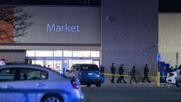 Authorities exit a Walmart, following a mass shooting early Wednesday, Nov. 23, 2022 in Chesapeake, Va. (Kendall Warner/The Virginian-Pilot via AP)