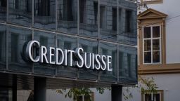 A picture taken on October 25, 2022 shows a sign of Switzerland's second-biggest bank Credit Suisse on a branch in Basel. (Photo by FABRICE COFFRINI/AFP via Getty Images)