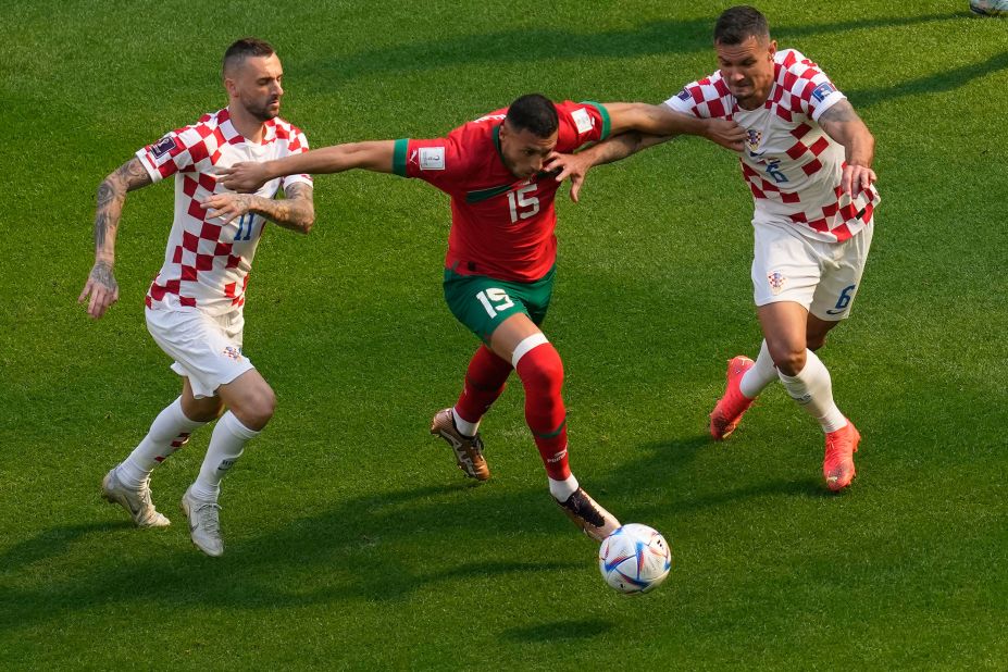 Morocco's Selim Amallah tries to dribble past Croatia's Marcelo Brozovic, left, and Dejan Lovren during their 0-0 draw on November 23. Croatia was the runner-up in the last World Cup.
