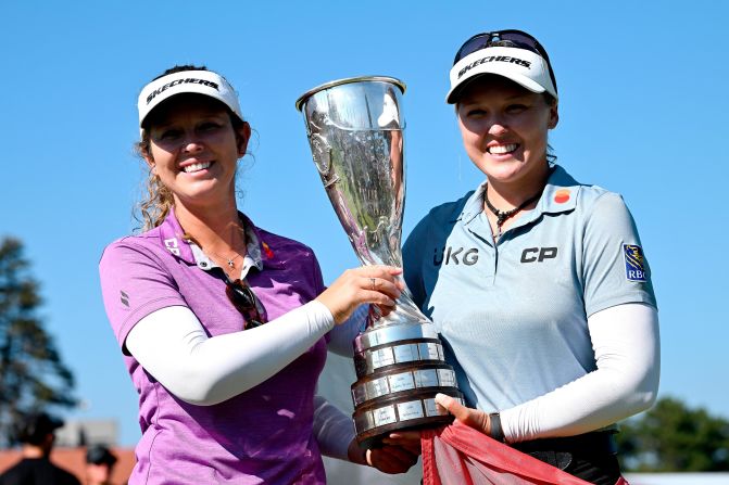 Keeping it in the family, Brooke Henderson (right) won the second major of her career at the Evian Championship in July with her sister -- and<a href="index.php?page=&url=https%3A%2F%2Fwww.cnn.com%2F2022%2F07%2F27%2Fsport%2Fbrooke-henderson-sister-caddie-brittany-evian-spt-spc-intl%2Findex.html" target="_blank"> long-time caddie</a> -- Brittany by her side.
