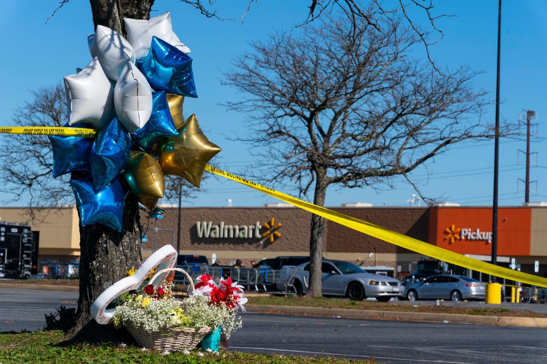 Flowers and balloons were placed near the scene of the shooting Wednesday.