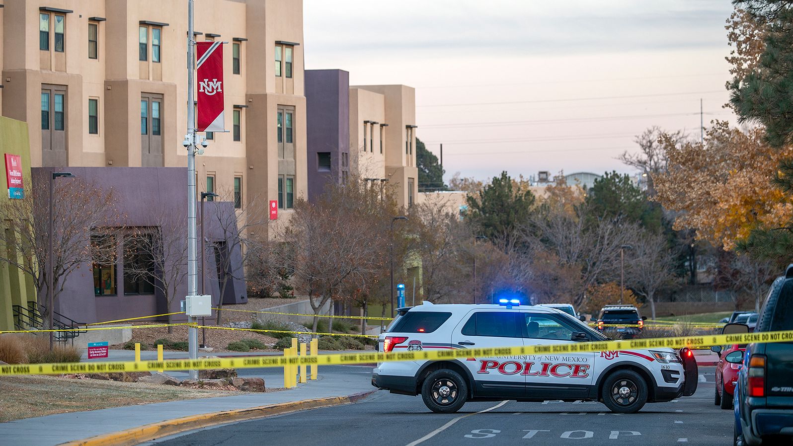 New Mexico State Police assists APD officers in investigating a deadly overnight shooting on the University of New Mexico campus Saturday.