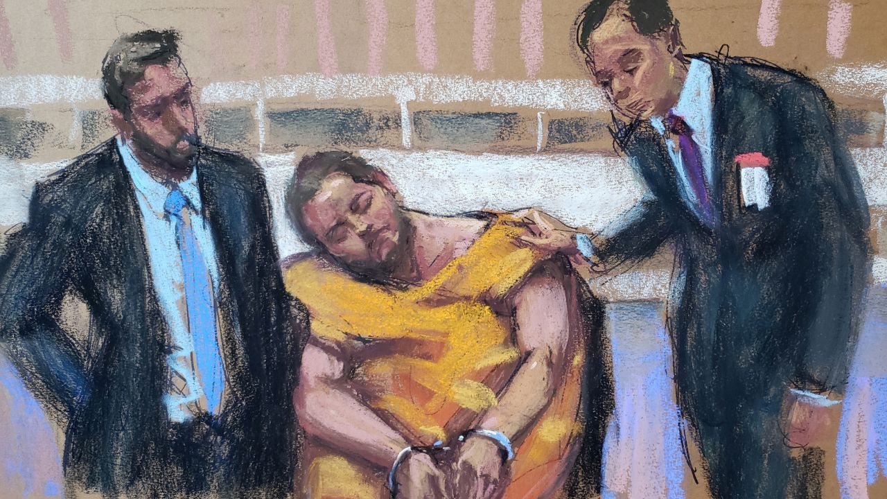 Anderson Lee Aldrich is seen in this court artist's sketch during an appearnce via video link, slumped in a wheelchair and  flanked by state public defenders, during a court hearing last month.