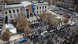 In this aerial photograph, a rainbow flag is draped over the Colorado Springs City Hall on November 23, 2022 in Colorado Springs, Colorado. The flag was hung in honor of the victims of a shooting at Club Q, an LGBTQ+ club where a gunman opened fire on November 19th, killing 5 and injuring 25 others.