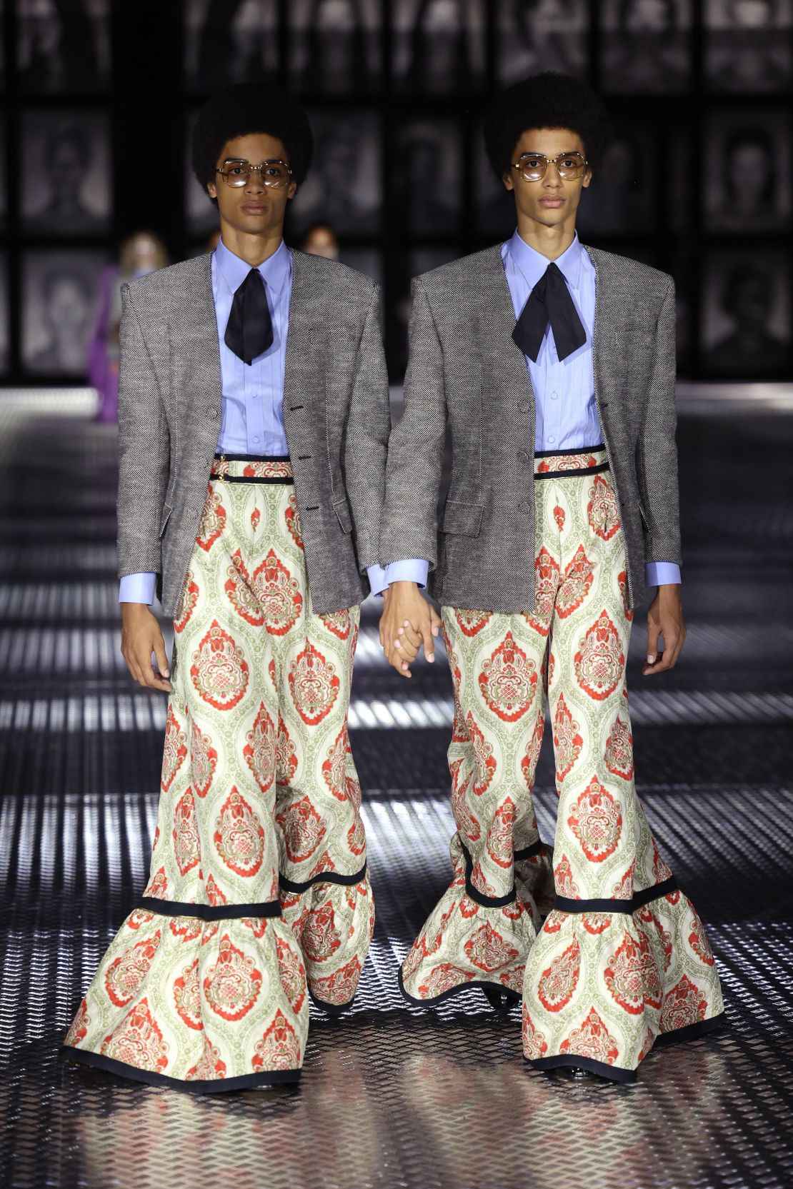 Models walk the runway at Milan Fashion Week in Michele's last major show for Gucci.