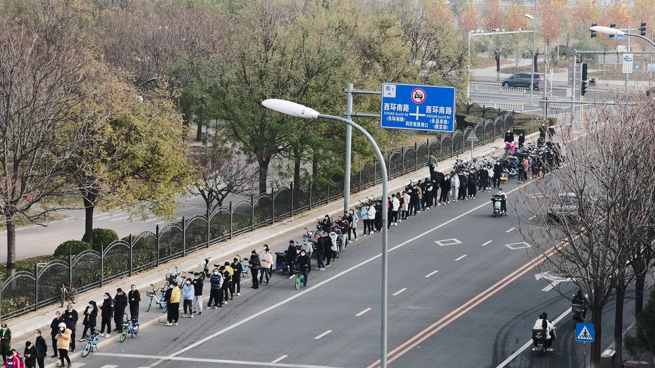 Citizens line up for nucleic acid tests in Beijing, China, on November 23, 2022.