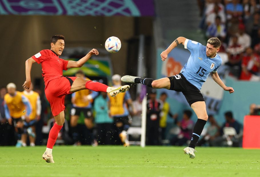 South Korea's Jung Woo-young competes for a ball with Uruguay's Federico Valverde on November 24. Their match ended 0-0.