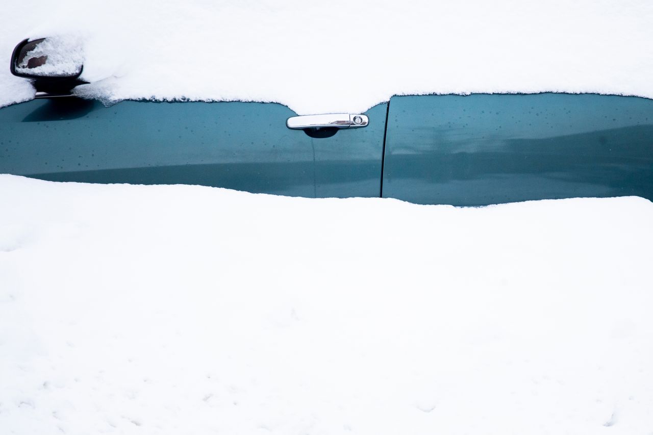 A car sits in a snowdrift in Buffalo, New York, on Friday, November 18. <a href="https://www.cnn.com/2022/11/18/weather/gallery/buffalo-snow-storm/index.html" target="_blank">Heavy snowfall</a> pounded parts of western New York.