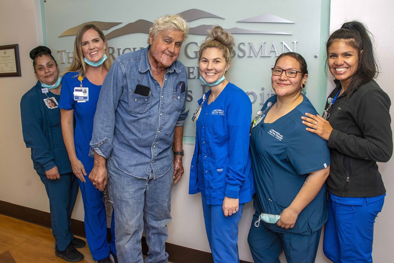 Comedian Jay Leno poses with members of the Grossman Burn Center after <a href="https://www.cnn.com/2022/11/21/entertainment/jay-leno-released" target="_blank">being discharged</a> in Los Angeles on Monday, November 21. The former "Tonight Show" host sustained burn injuries in a gasoline fire about nine days ago.