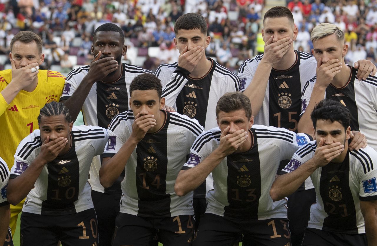 Before their World Cup opener on Wednesday, November 23, Germany's starting 11 posed for their team photo with their right hands in front of their mouths. The team's social media feed confirmed that <a href="https://www.cnn.com/sport/live-news/world-cup-11-23-22/h_d06430578d0638bd3e9c4c995ea621d0" target="_blank">the gesture was designed to protest</a> FIFA's decision to ban the "OneLove" anti-discrimination armband that many European captains had been hoping to wear in Qatar.