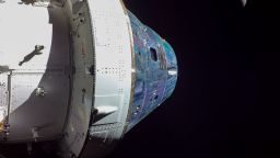 On Flight Day 8, NASA's Orion spacecraft remains two days away from reaching its distant retrograde orbit. The Moon is in view as Orion snaps a selfie using a camera mounted on one of its solar array at 10:57 p.m. EST..
