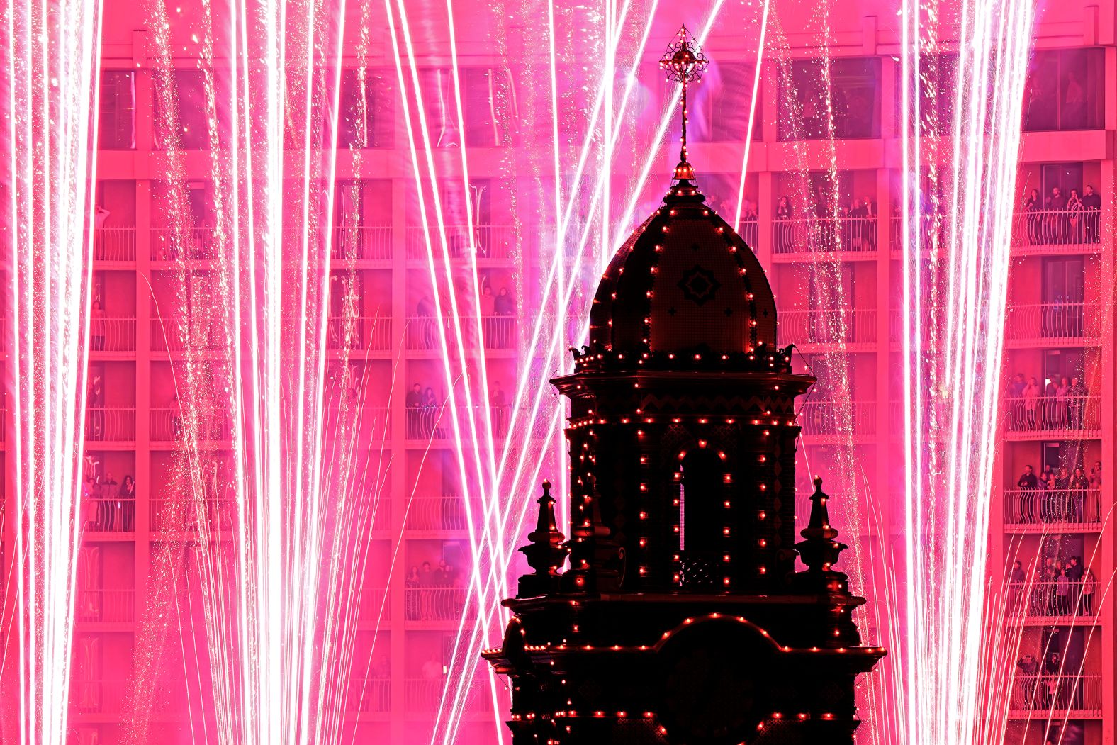 Christmas lights at the Country Club Plaza shopping district in Kansas City, Missouri, are switched on amidst fireworks on Thursday. The Thanksgiving night ceremony featuring more than 200,000 bulbs covering a 15-block area has been a tradition for more 90 years at the shopping center, marking the beginning of the Christmas shopping season.