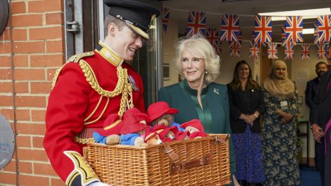 Camilla personally handed over some of the thousands of Paddington bears in memory of the Queen.