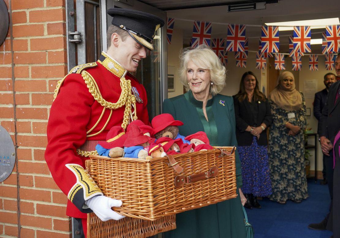 Camilla personally delivered some of the thousands of Paddington Bears left in the Queen's memory.