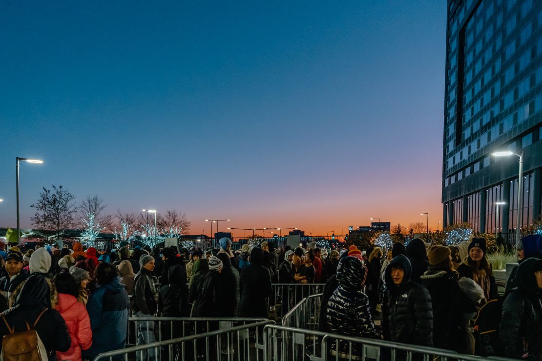 People line up outside the mall before it opened on Black Friday.