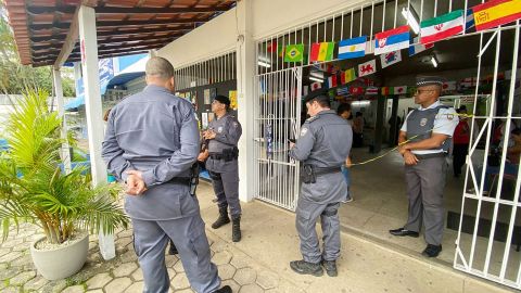Police officers on the scene at the Primo Bitti school on Friday.