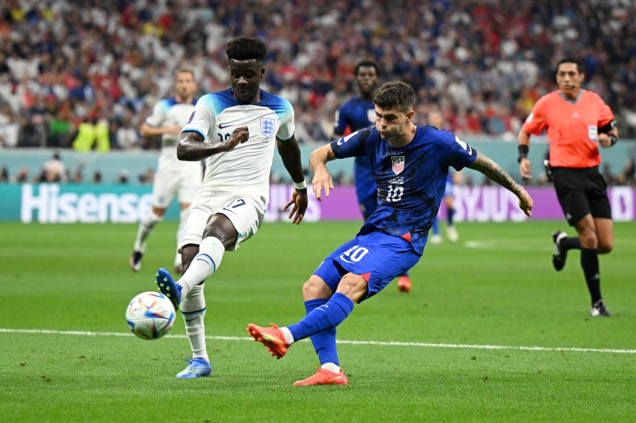 US star Christian Pulisic takes a shot against England in the first half of their World Cup match on November 25. The shot  smacked off the crossbar, and the game would eventually end 0-0.