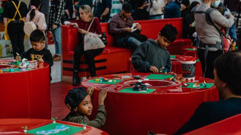 Children play at the mall's Lego store.