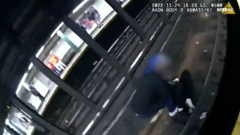 Bodycam video released by authorities shows the good Samaritan trying to help the man on the tracks when officers arrived.
