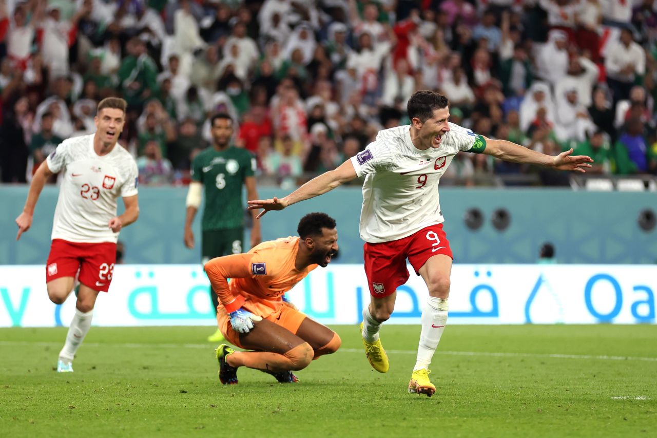 Robert Lewandowski celebrates after scoring Poland's second goal in the 2-0 win against Saudi Arabia on November 26. This was Lewandowski's first-ever World Cup goal.