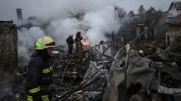 Rescuers work at a site of private houses heavily damaged by a Russian missile strike, amid Russia's attack on Ukraine, in Dnipro, Ukraine November 26, 2022.