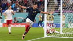 France's Kylian Mbappe celebrates after scoring his second goal during the World Cup group D soccer match between France and Denmark, at the Stadium 974 in Doha, Qatar, Saturday, Nov. 26, 2022. 