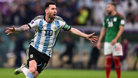 Lionel Messi celebrates scoring the opening goal against Mexico.