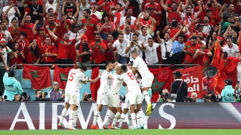 Morocco celebrates after scoring its first goal against Belgium in its last match. 