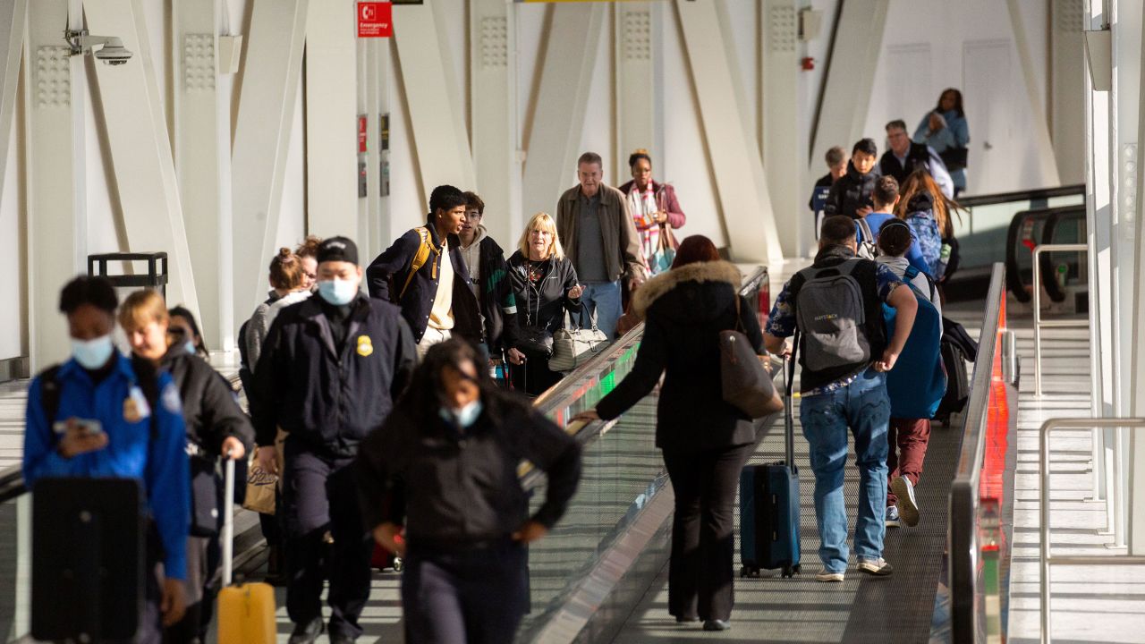 Travelers at Terminal 5 at John F. Kennedy International Airport (JFK) ahead of the Thanksgiving holiday in New York, US, on Wednesday, Nov. 23, 2022. Planes and airports are expected to be bustling this Thanksgiving, traditionally one of the most traveled holidays of the year.