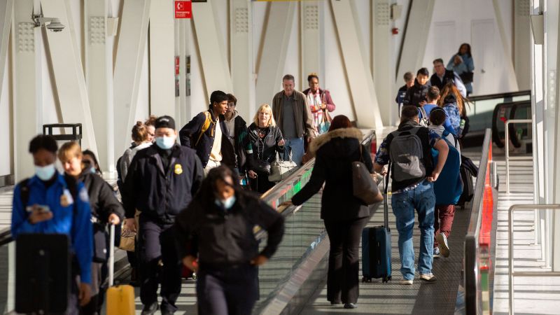 Read more about the article Thousands of US flights delayed Sunday as major storm system hampers travel – CNN