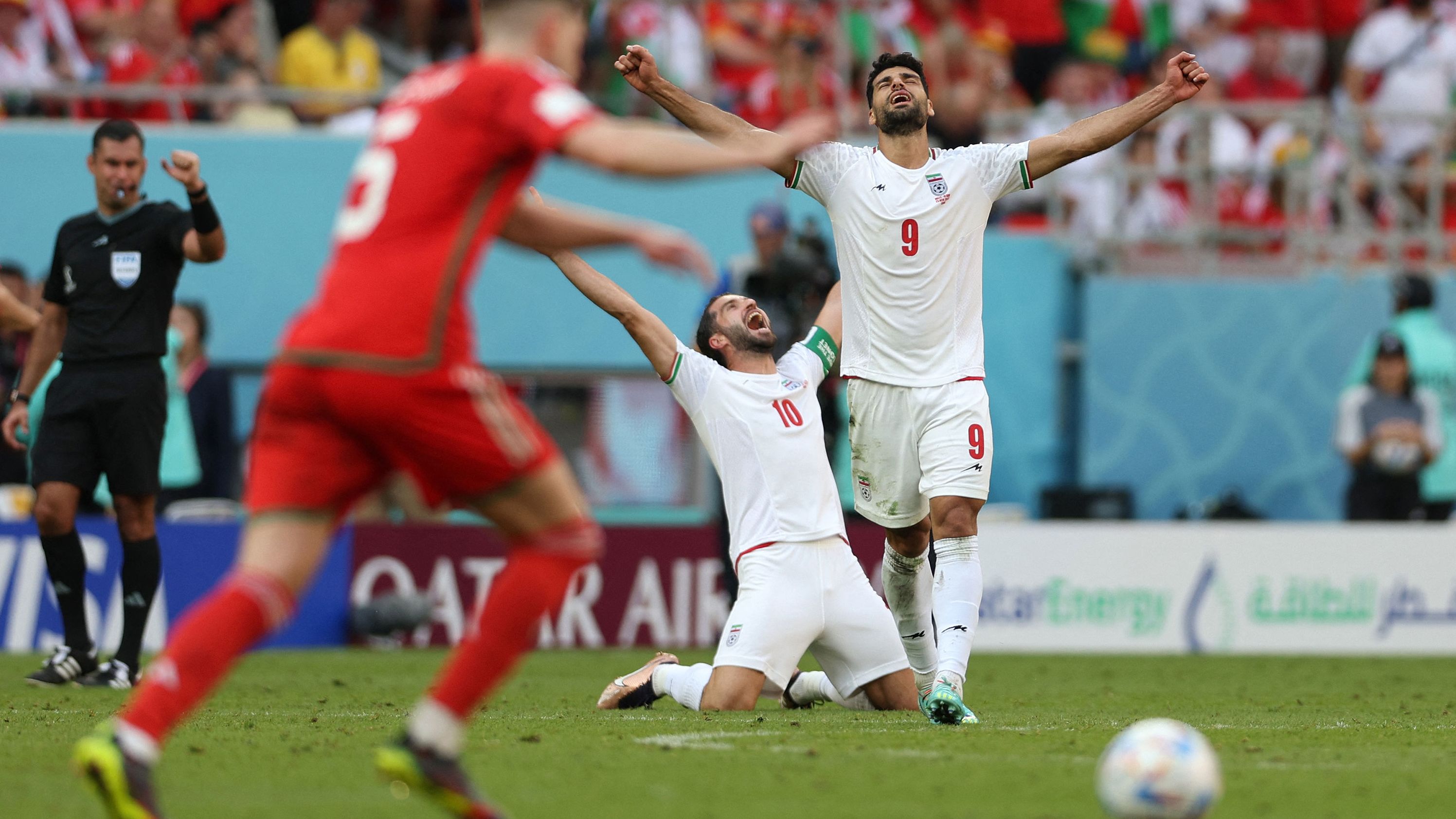 Iran celebrates defeating Wales.