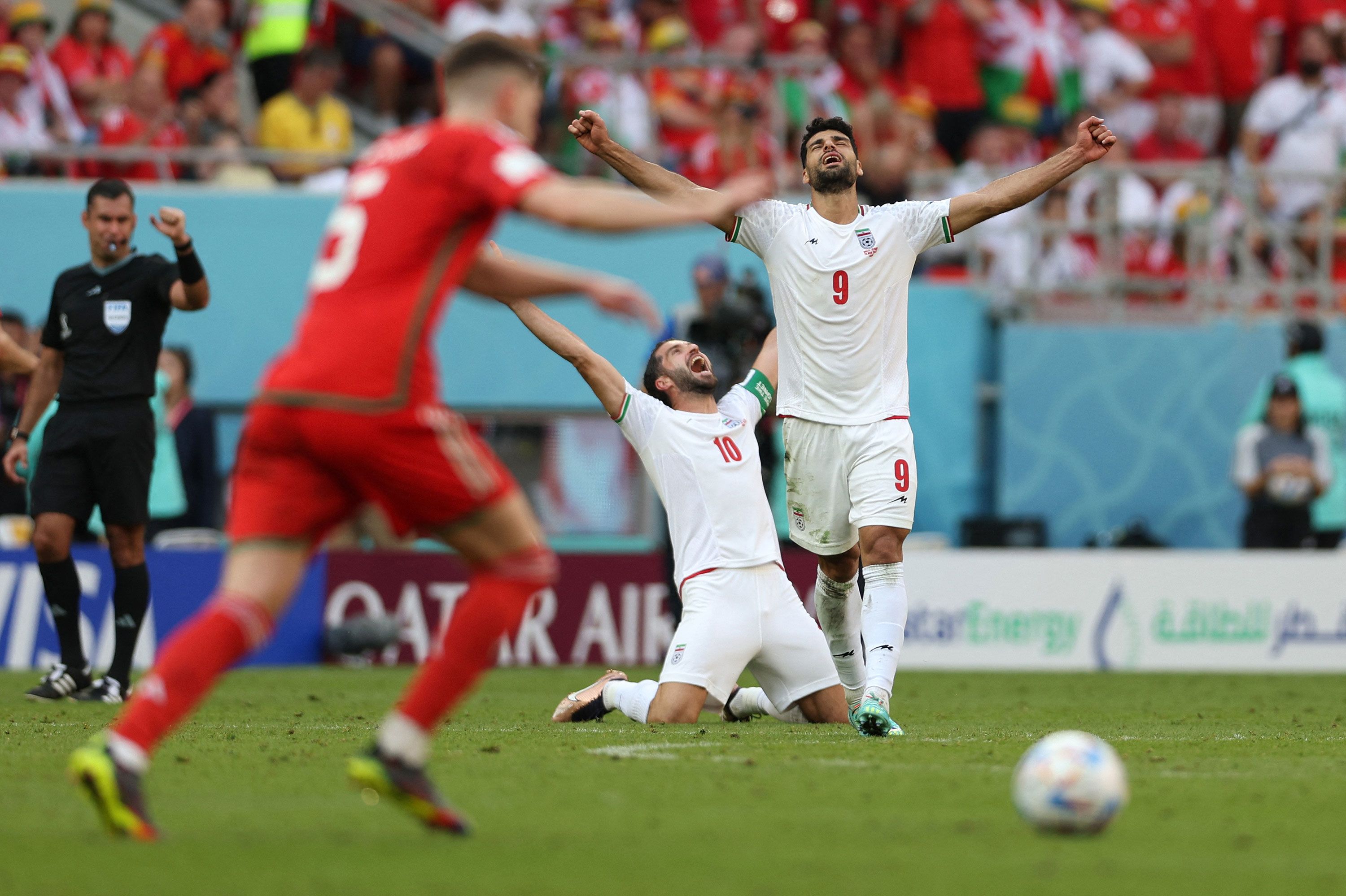 WORLD CUP SOCCER: USA hangs on against Iran to advance