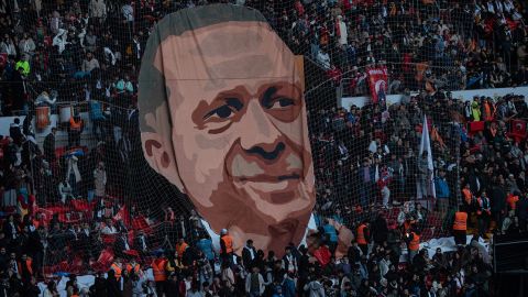 A giant poster of Turkey's President Recep Tayyip Erdogan is put on display at a stadium rally on Sunday in Istanbul. In next June's general election, the Turkish president is looking for another term in the office he has occupied since 2014.  