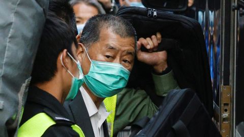 Media tycoon Jimmy Lai, founder of Apple Daily, looks on as he leaves the Court of Final Appeal by prison van in Hong on February 1, 2021. 