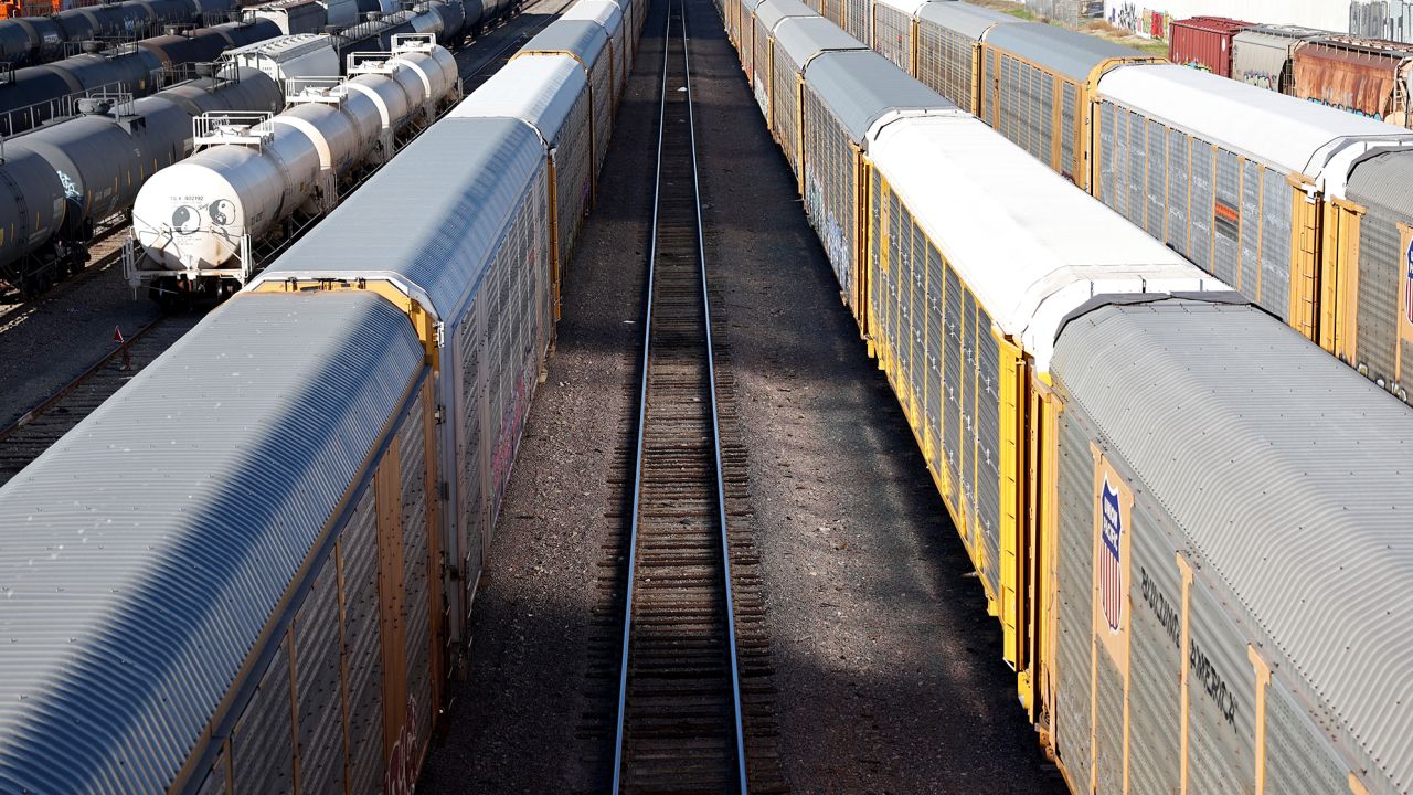 Freight rail cars sit in a rail yard on November 22, 2022 in Wilmington, California. A national rail strike could occur as soon as December 9 after the nation's largest freight rail union, SMART Transportation Division, voted to reject the Biden administration's contract deal. About 30 percent of the nation's freight is moved by rail with the Association of American Railroads estimating that a nationwide shutdown could cause $2 billion a day in economic losses.  