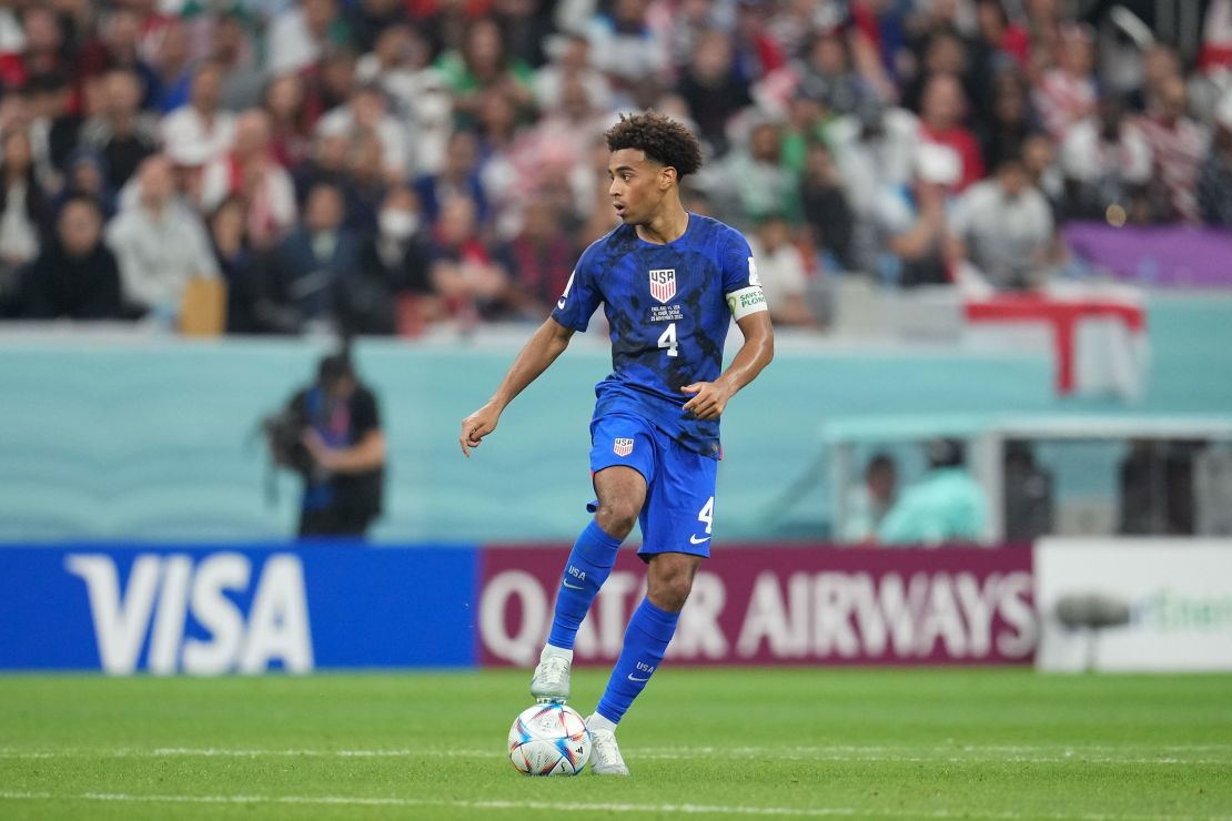 Adams with the ball during the US' game against England at the 2022 World Cup. 
