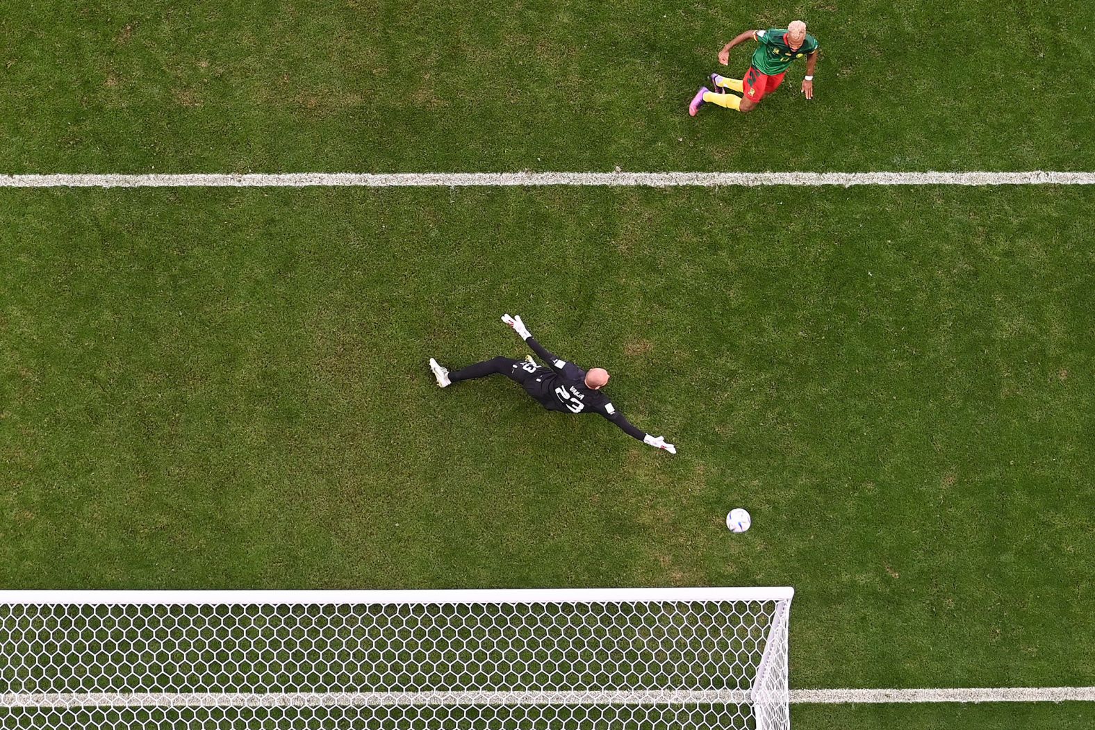 Cameroon forward Eric Maxim Choupo-Moting scores his team's third goal against Serbia, tying the match in the second half.