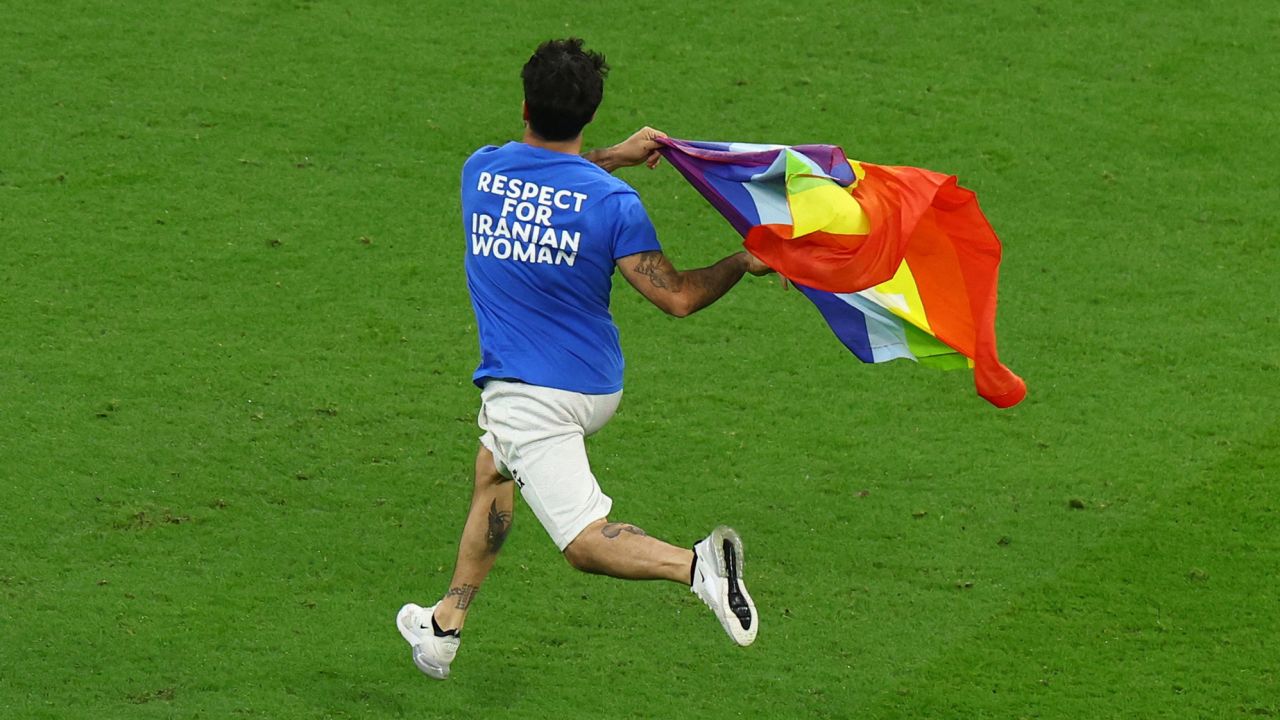 Portugal vs. Uruguay: Pitch invader with rainbow flag interrupts World Cup  match