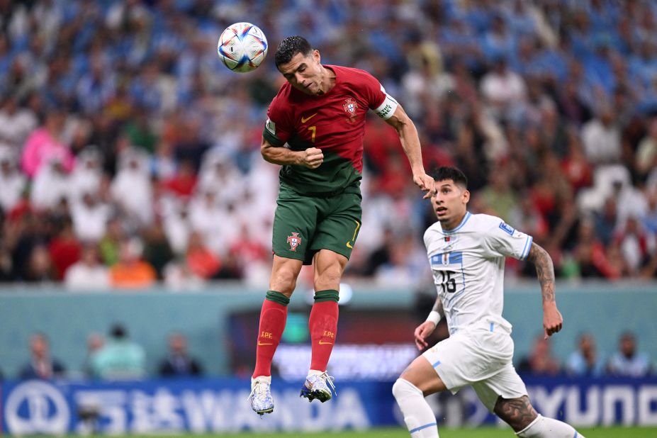 Portugal forward Cristiano Ronaldo tries to head the ball toward goal in the second half of the Uruguay match. He appeared at first to nod in the first goal, but after review it was determined that he didn't touch it and Bruno was credited with the goal.